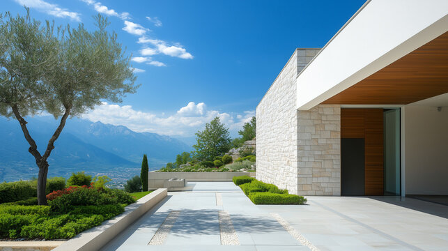 Luxury house entrance under a clear blue sky, showcasing elegance and tranquility in a serene outdoor setting.