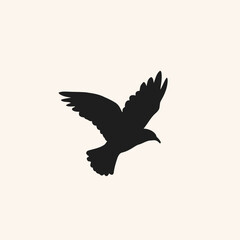 Obraz premium A stylized vector silhouette of a dove flying with outstretched wings, symbolizing peace and freedom