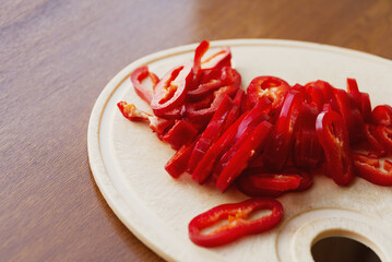 Chopped hot spice on a cutting board.