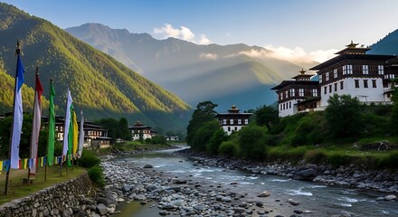 Traditional Bhutanese Monastery Village in Mountain Valley with River and Flags