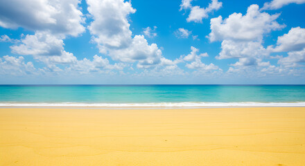 Idyllic Beach Scene with Golden Sand Turquoise Water and Fluffy White Clouds Under a Bright Blue Sky in Broad Daylight