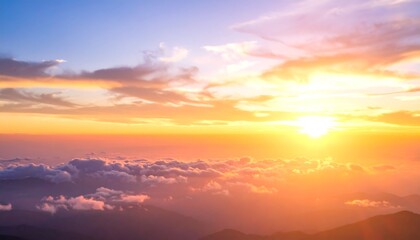 Obraz premium Sunrise over mountain cloudscape