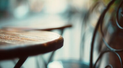 Obraz premium Close-up of a wooden table with a blurred background. the table is in focus, while the background is slightly out of focus, creating a soft and dreamy atmosphere.