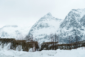 Snowy Mountains with Wooden Structures
