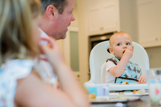 Family dinner time with baby
