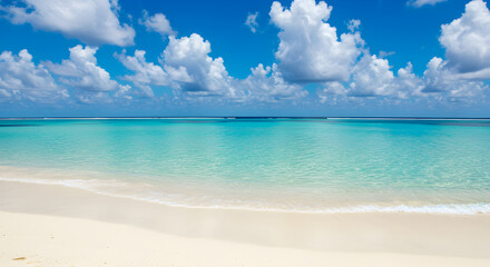 Obraz premium Tranquil Azure Sea with White Sandy Beach Under Cloudy Blue Sky