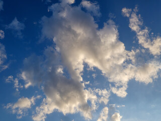 Bright Blue Sky with Fluffy White Clouds