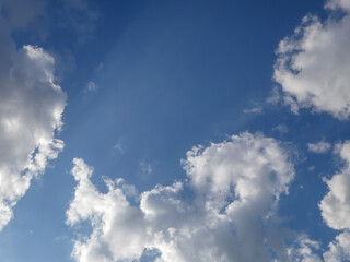 Bright Blue Sky with Fluffy White Clouds