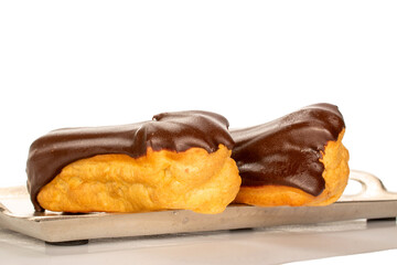 Chocolate sweet eclair, macro, isolated on white  background.