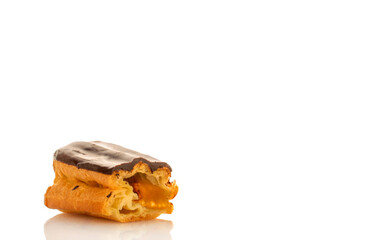 Chocolate sweet eclair, macro, isolated on white  background.