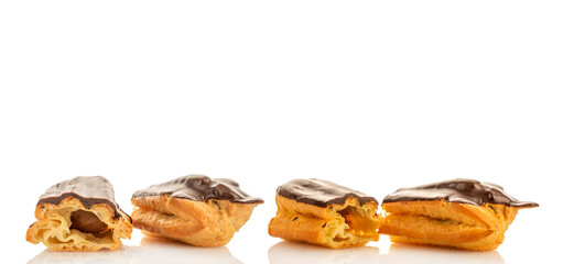 Chocolate sweet eclair, macro, isolated on white  background.