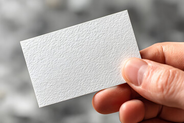 Rough Textured Blank Business Card Mockup in Hand