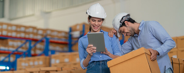 Warehouse worker working in warehouse storage. Foreman or worker work at factory site check up products in site. Inventory worker working in  factory Storehouse
