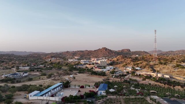 Remote Town With the Sarawat Mountains In The Background Near Al Taif In Saudi Arabia. Aerial Shot