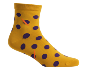 Isolated yellow sock with purple polka dots, warm and comfortable for sport or casual wear