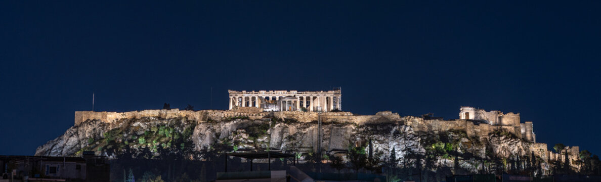 Illuminated Acropolis hill with Parthenon at night, Athens, Greece.