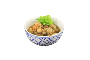 Delectable Cuisine in Ceramic Bowl: A close-up shot of a ceramic bowl filled with savory stew and aromatic herbs, artfully arranged. The bowl’s intricate pattern frames the rich colors of the dish.