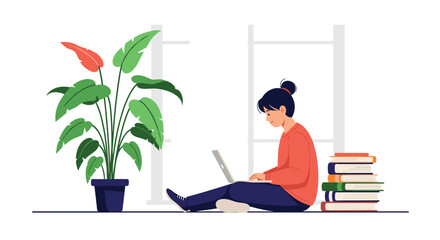 A young person works on a laptop next to a plant and a stack of books.