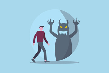 Man walking away from a scary monster shadow representing fear or anxiety