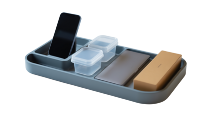 A modern minimalist desk organization tray in matte gray plastic. The tray has multiple compartments and sections containing various office items. isolated on a transparent background.