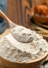 The process of an experienced chef making bread using flour