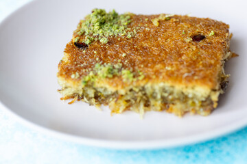 Close-Up of Turkish Kadaif Dessert on a Pink Plate
