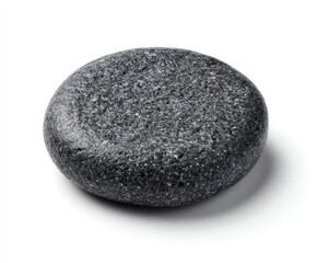 Dark gray, smooth, round stone on white background