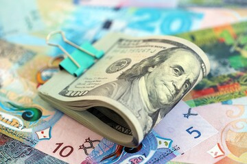 Kuwaiti dinar currency money bills and bunch of us dollar banknotes. Concept of currency exchange