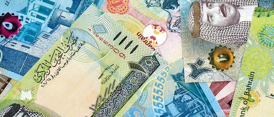 Bahraini dinar currency money bills. The current banknotes lies on table in big amount