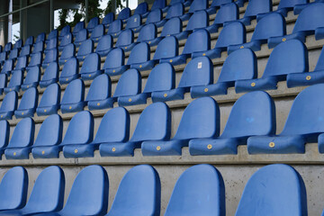 Fototapeta premium Close-up view of rows of football stadium seats.