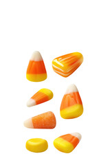 Assorted colorful candy corn pieces for Halloween, isolated on black.