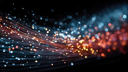 Fototapeta premium Abstract fiber optics glowing with vibrant light strands, representing high-speed data transmission, telecommunications, and futuristic technology. 