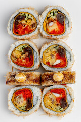 Sushi roll with salmon and caviar close up macro isolated