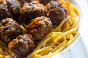 Close-Up of Spanish Albondigas Meatballs in Tomato Sauce on Spaghetti