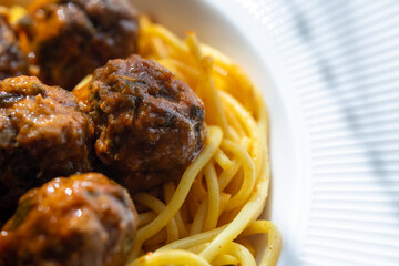Close-Up of Spanish Albondigas Meatballs in Tomato Sauce on Spaghetti