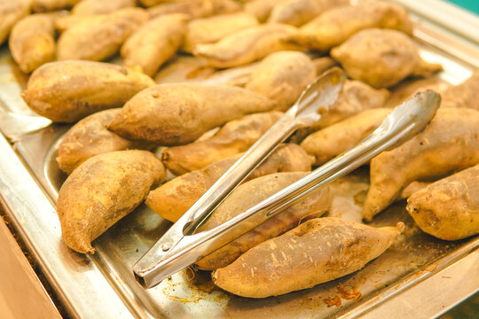 Boiled cassava or telo, Indonesian traditional snack on a supermarket display for sale.