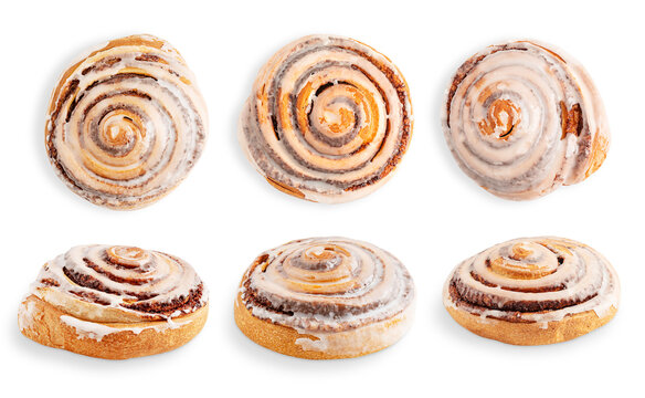 Collection group or set of six different delicious sweet homemade freshly baked cinnamon roll buns glazed with sugar icing isolated on white background served for breakfast as pastry comfort food