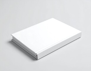 Blank white book on a gray surface
