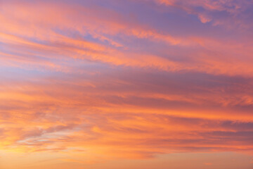 Stunning twilight background with glowing sunset sky and dramatic cloud formations offering a beautiful natural atmosphere scene