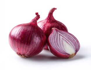 Fototapeta premium Two whole and one sliced red onion on white