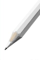 Close-up of a single, white pencil, angled, showing the sharpened tip and wood-like interior