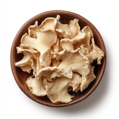 Dried mushrooms in a wooden bowl