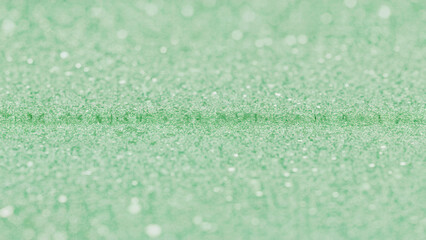 Obraz premium Abstract Green Glitter Texture Background for Festive Decoration and Design