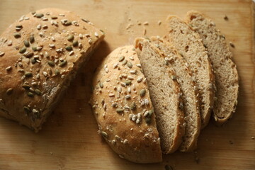 Close up of rustic bread loaf on wooden table