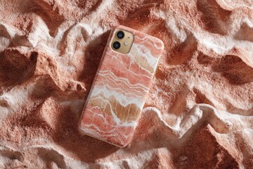 Pink phone case, marble design, desert backdrop
