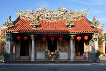 Naklejka premium Yilan, Taiwan - Sep. 13, 2025: Historic Yong'an Temple interior in Wujie Yilan dedicated to Mazu goddess, county heritage site with traditional Chinese religious architecture.