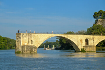 Saint-Benezet Bridge, medieval architecture on the banks of the Rhone River in Avignon, France.