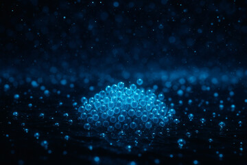 An otherworldly swarm of glowing blue orbs creating a magical, abstract light display. A concept of wonder, fantasy, and ethereal beauty in the darkness.