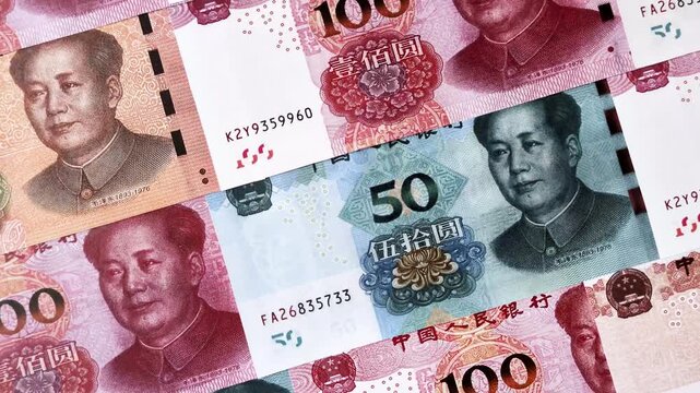 Chinese paper money, yuans in various denominations. China money as a business background for your design