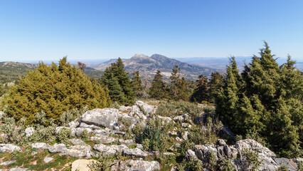 Panoramic view of an Andalusian white village in the mountains. Nature and tranquility